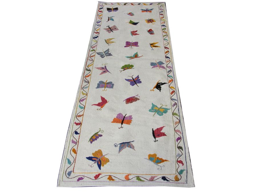 Hand-embroidered rug, woven to the customer's own design, woven to order