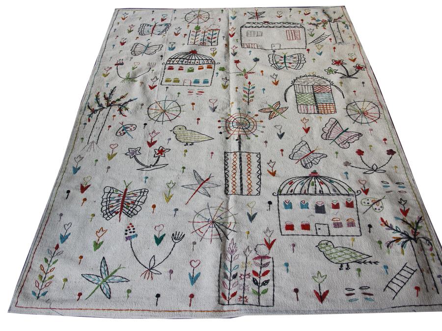 Hand-embroidered rug, woven to the customer's own design, made to the customer's measurements