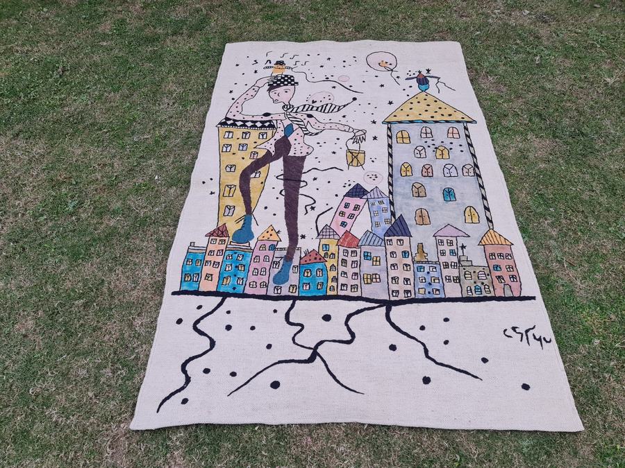 Custom hand-embroidered rug with a pictorial design, handwoven in any size or colour