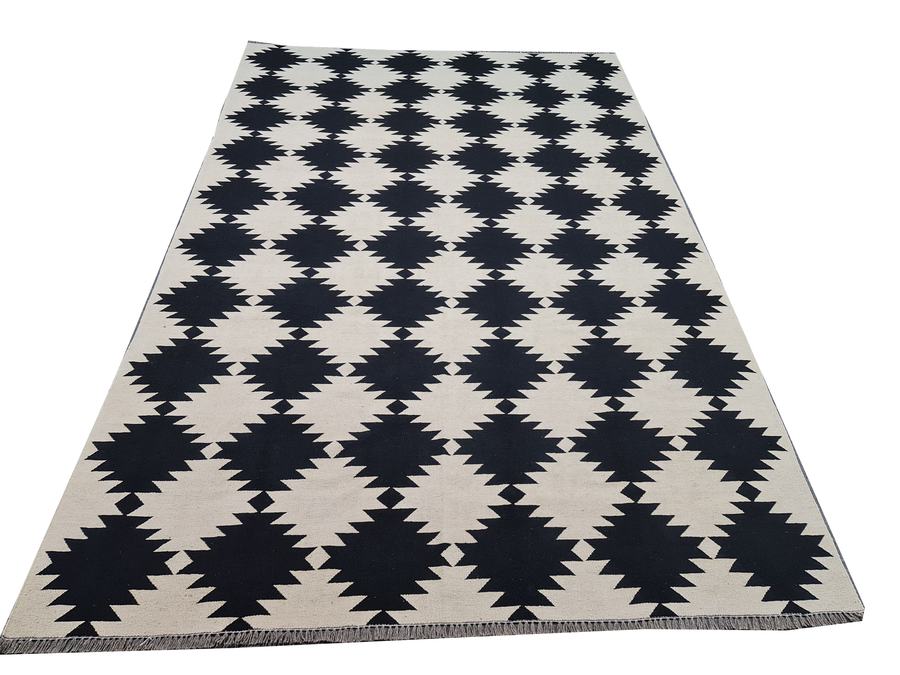 Custom flatweave kilim rug in black and white, handwoven in any size or colour