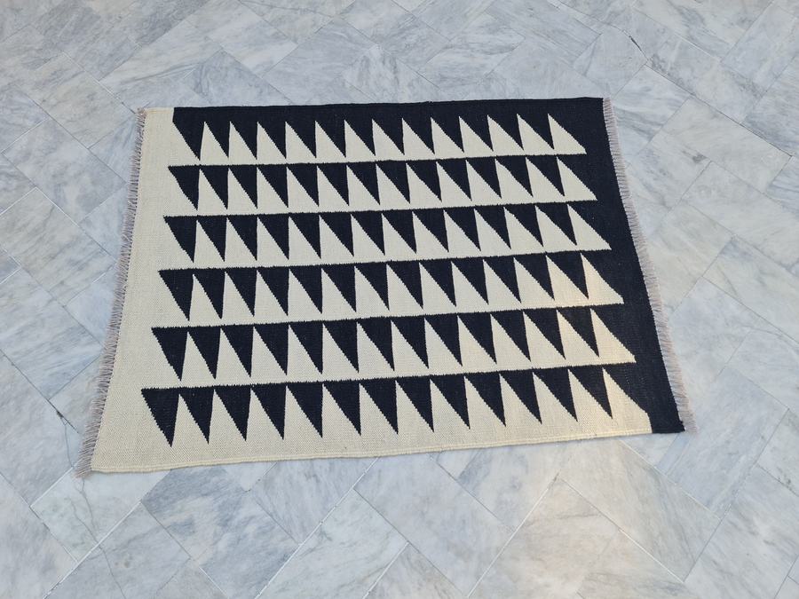 Flatweave kilim rug in black and white, handwoven on our own looms