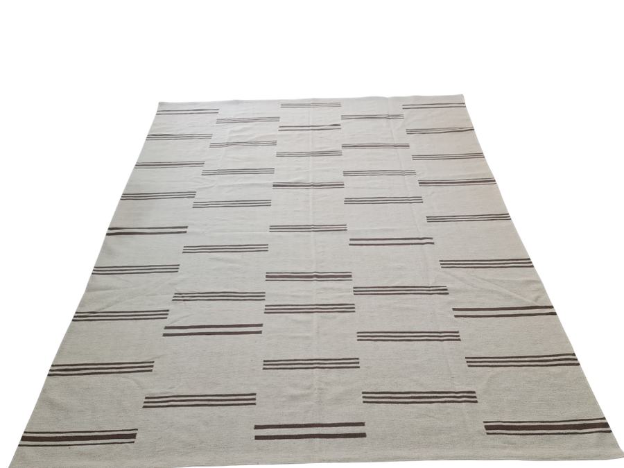 Flatweave kilim rug in brown and ivory, handwoven on our own looms