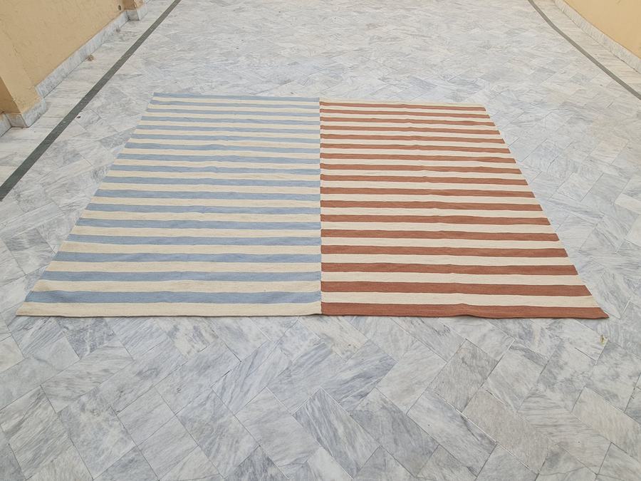 Flatweave kilim rug with a multicolor and striped design, woven in our Lahore workshop