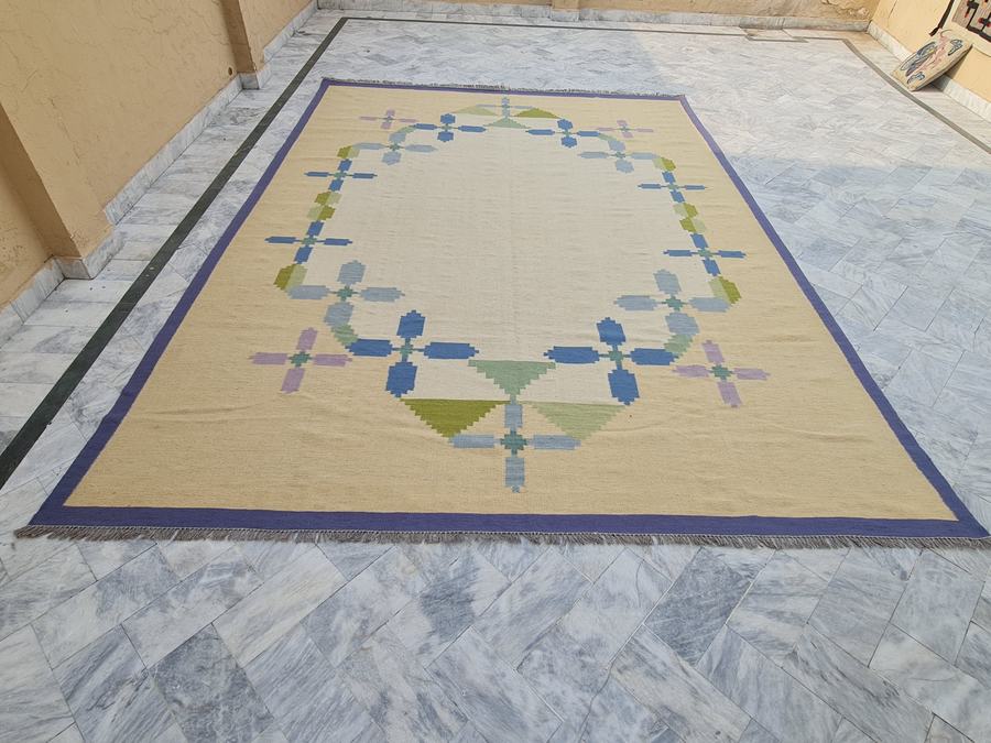 Flatweave kilim rug with a scandinavian design, woven in our Lahore workshop