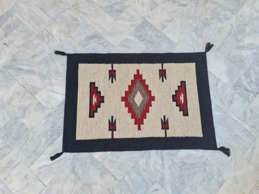 Southwestern flatweave rug with a large design, woven in our Lahore workshop