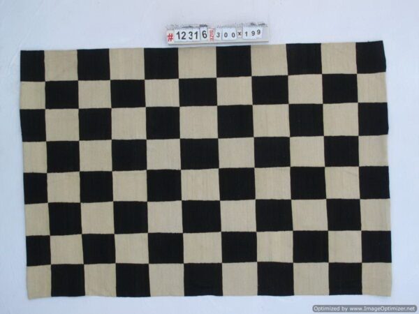 High-Contrast Black and White Checkered Flatweave Wool Rug for a Bold Statement