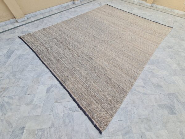 modern Brown and White Moroccan Hand Knotted Wool Rug for bare feet in bedroom