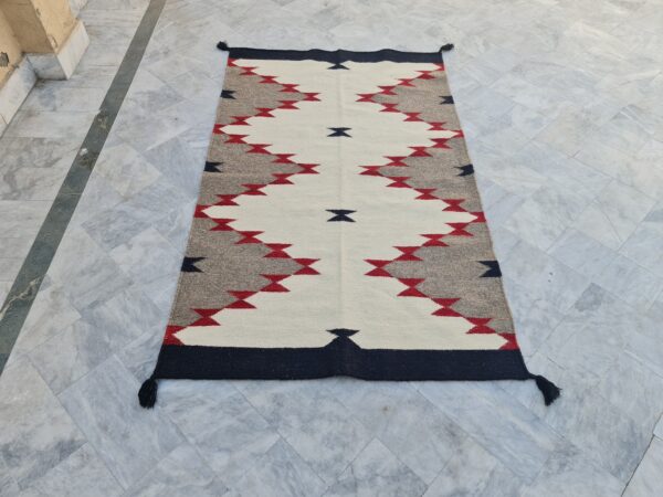 Brown, White, and Multicolor Navajo Flatweave Wool Rug